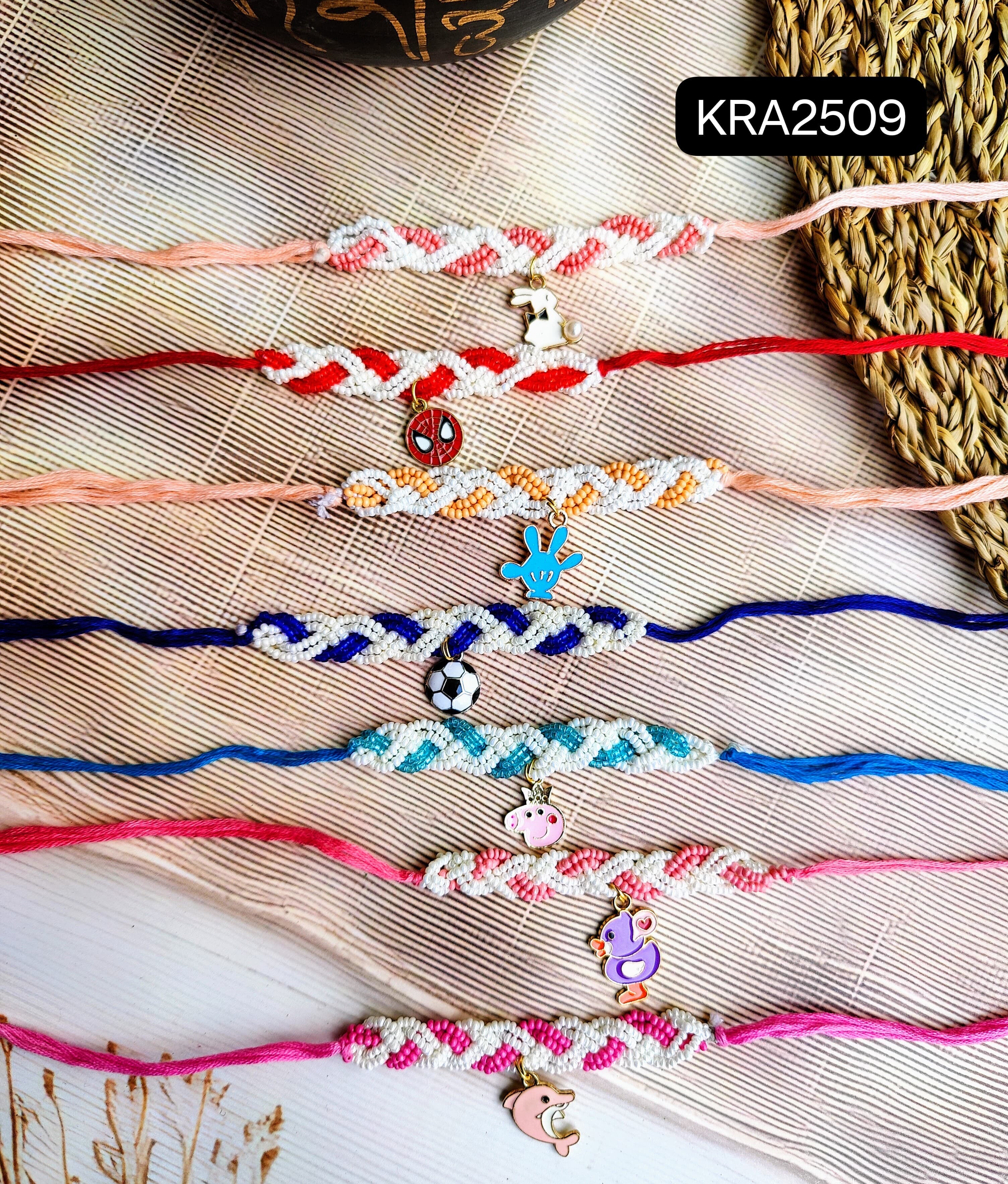 Kids Pearl Rakhis With Metal Charms (KRA2509)