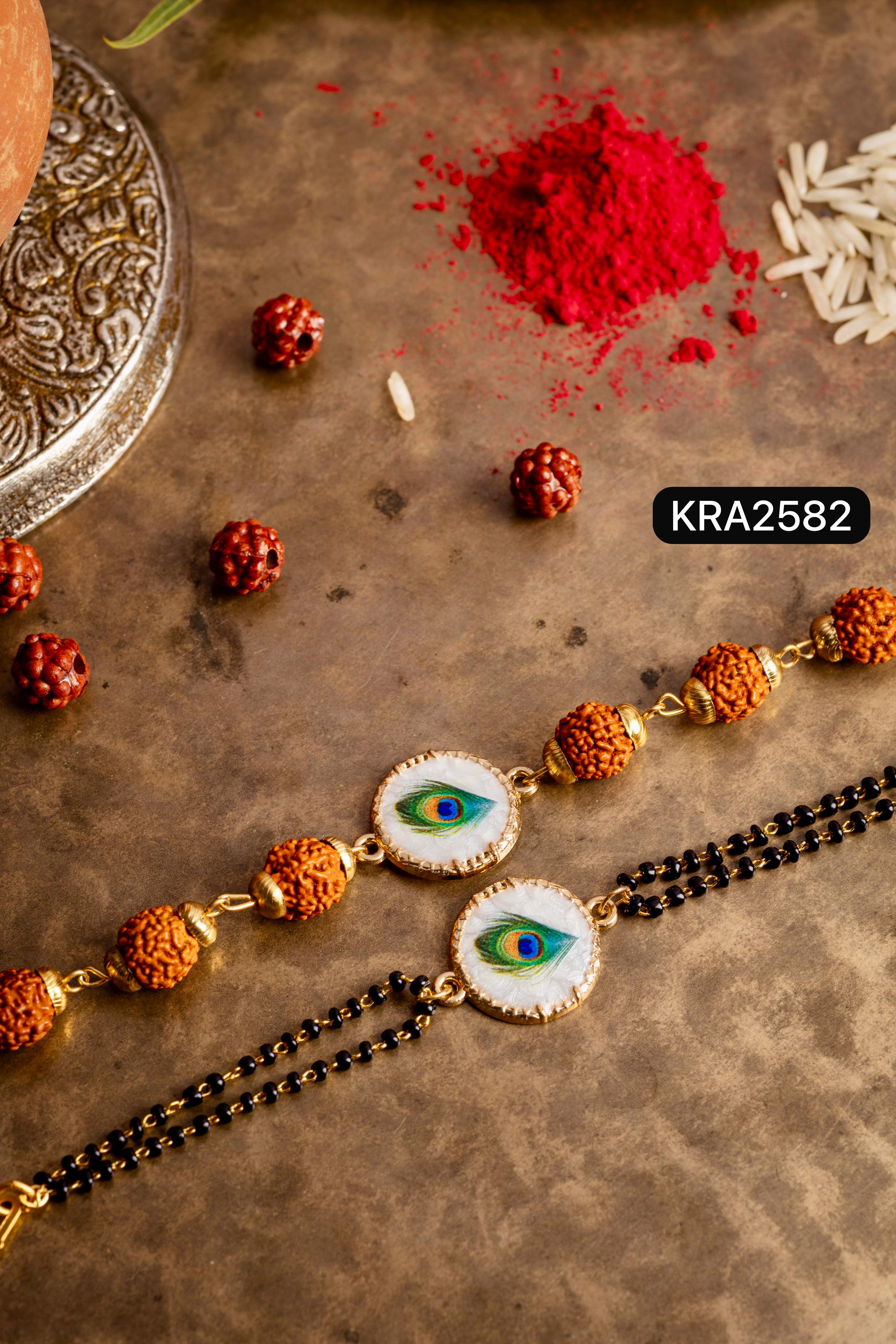 Mother Of Pearl Morpankh Rudraksha Bracelet For Bhai With Black Beads Bracelet For Bhabhi (KRA2582)