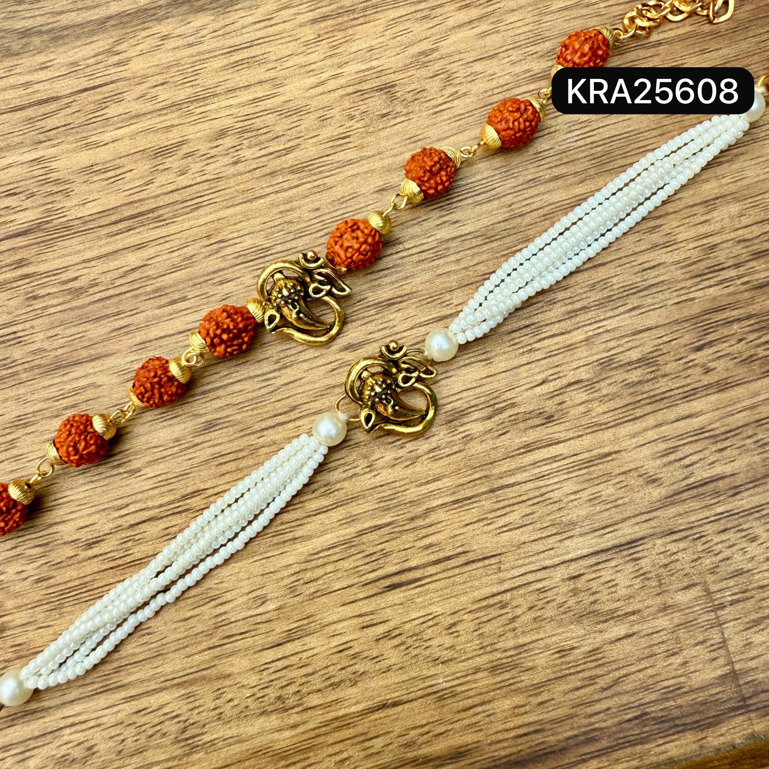 OM With Ganesh Ji Metal Broach Rudraksha Bracelet With Pearls Bracelet Set (KRA25608)