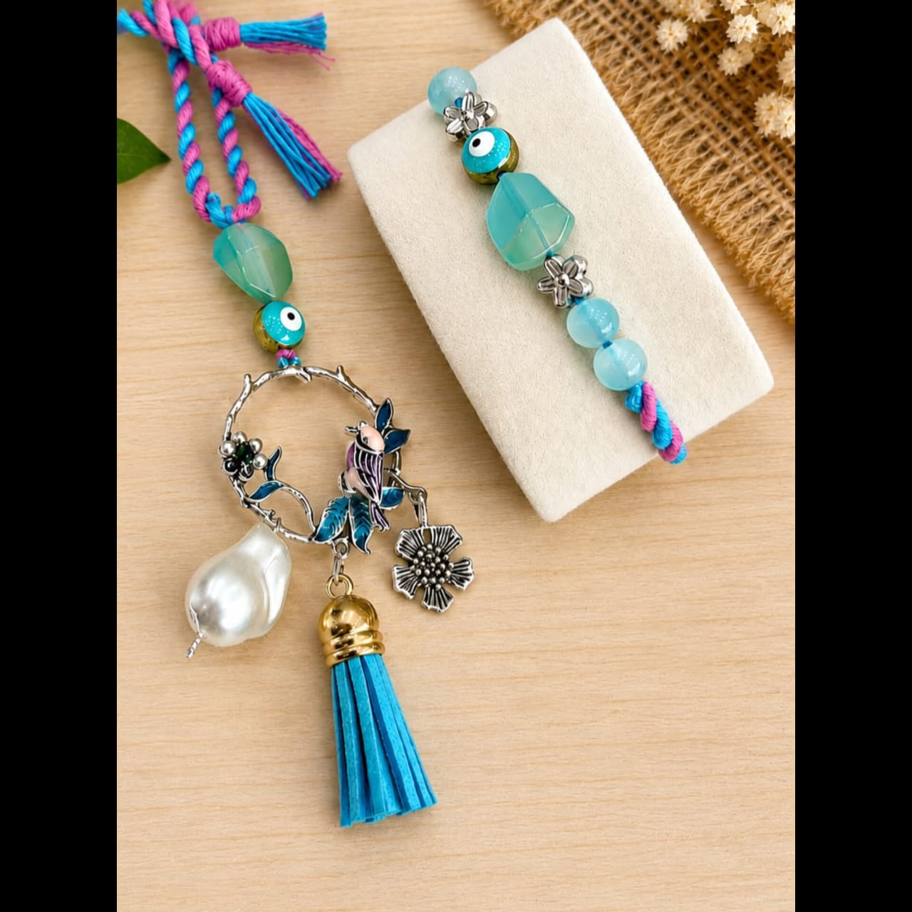 Designer Stone Rakhi With Bird Lumba