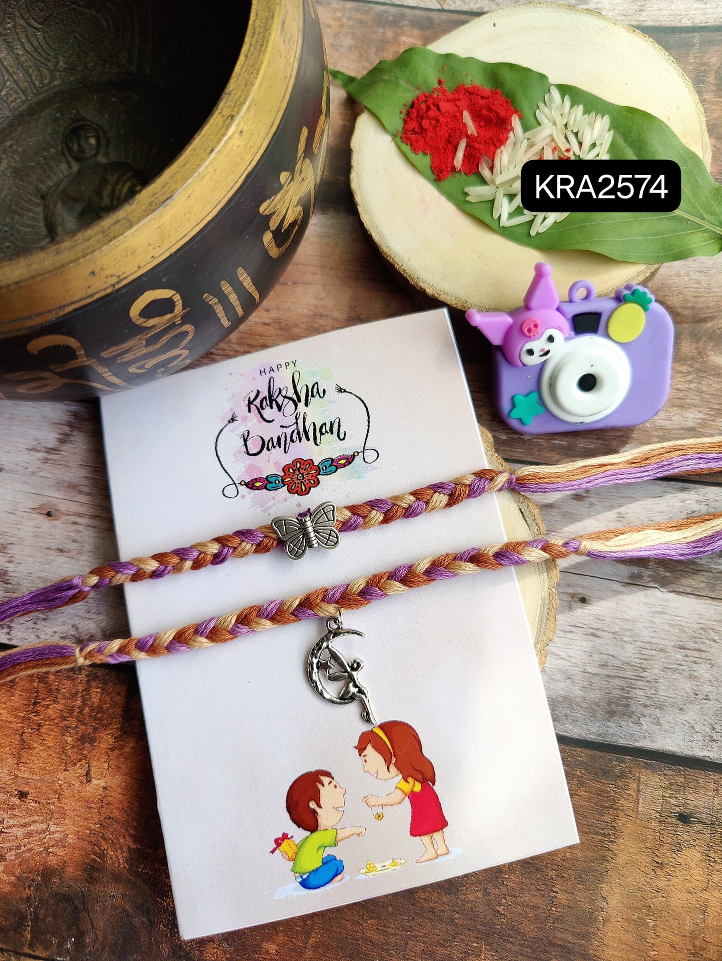 Braided Thread Rakhi With Metal Charm (KRA2574)