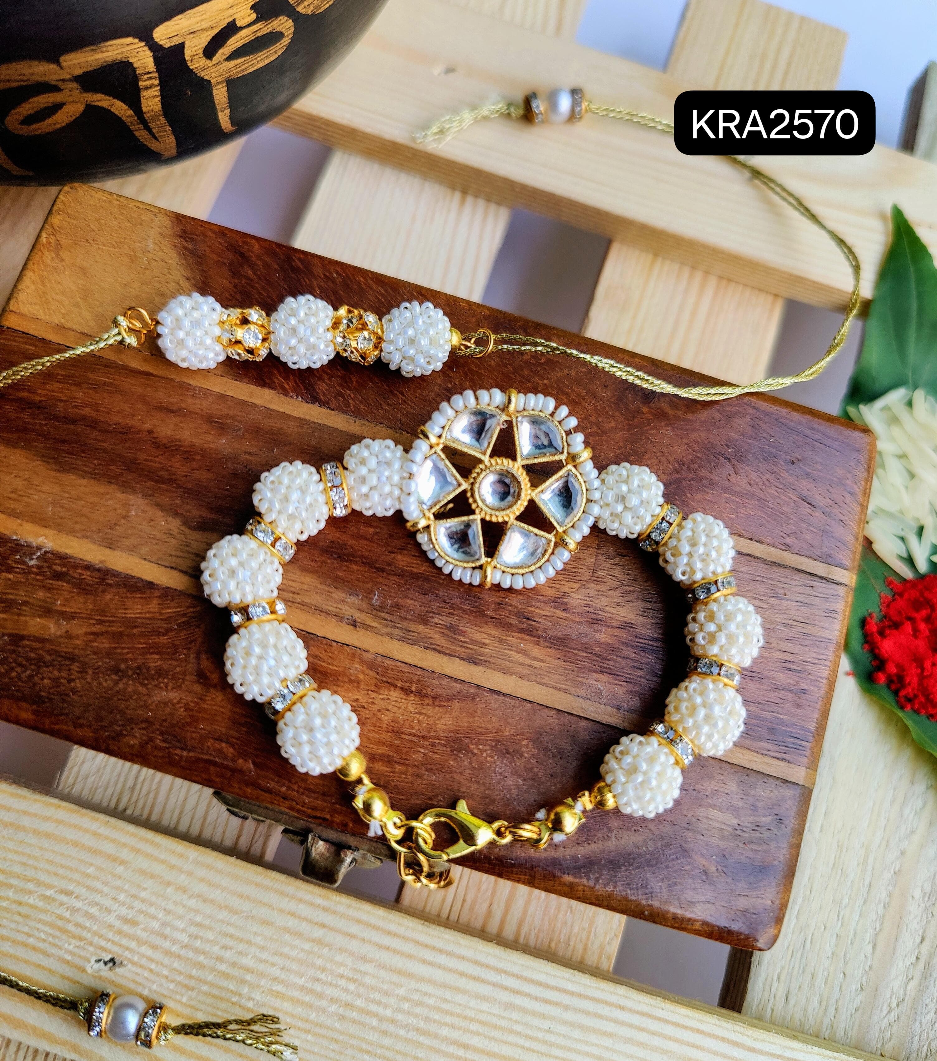 Elegant Cheed Rakhi & Bracelet Set (KRA2570)