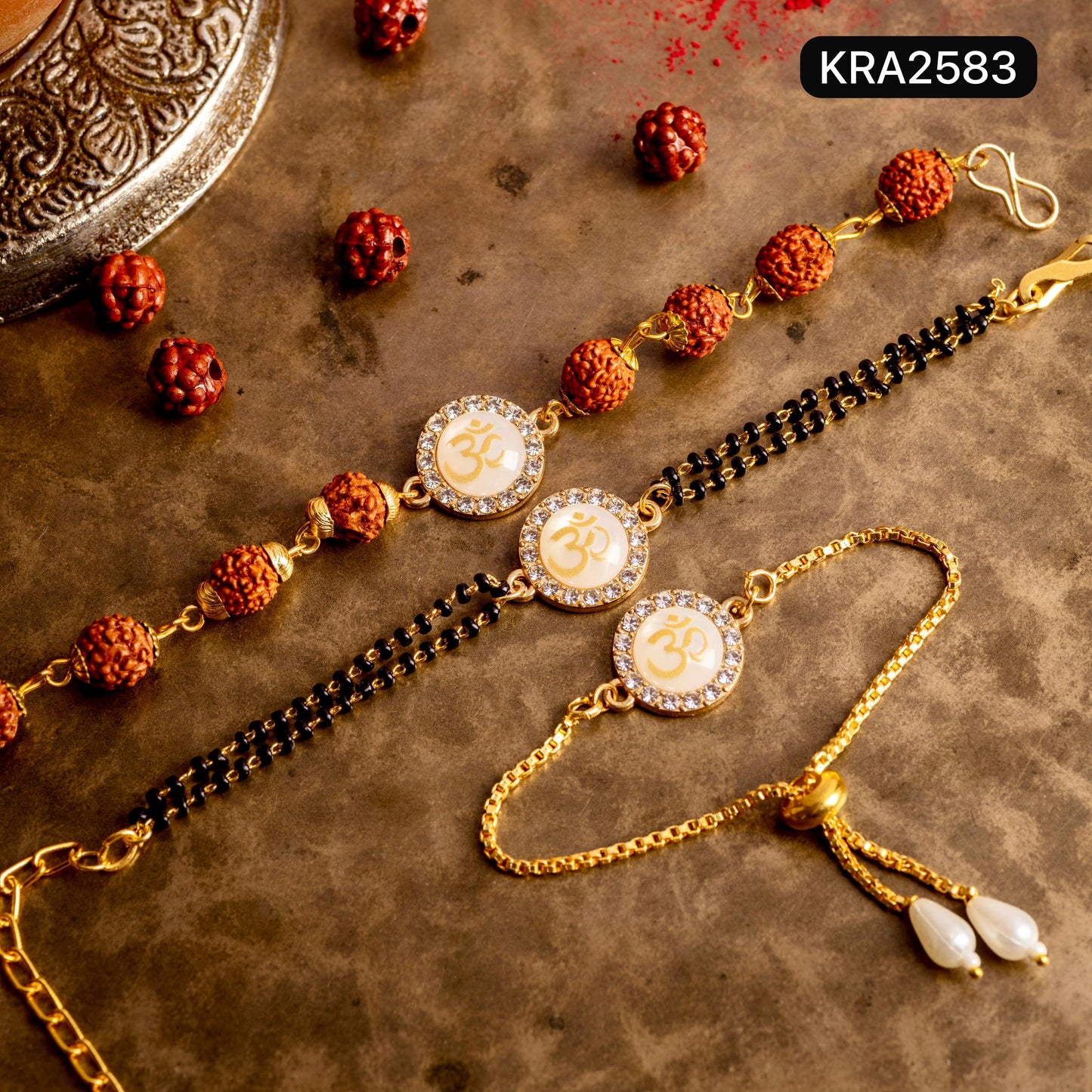Monalisa AD Studded OM Rudraksha Bracelet For Bhai With Black Beads/Golden Bracelet For Bhabhi (KRA2583)