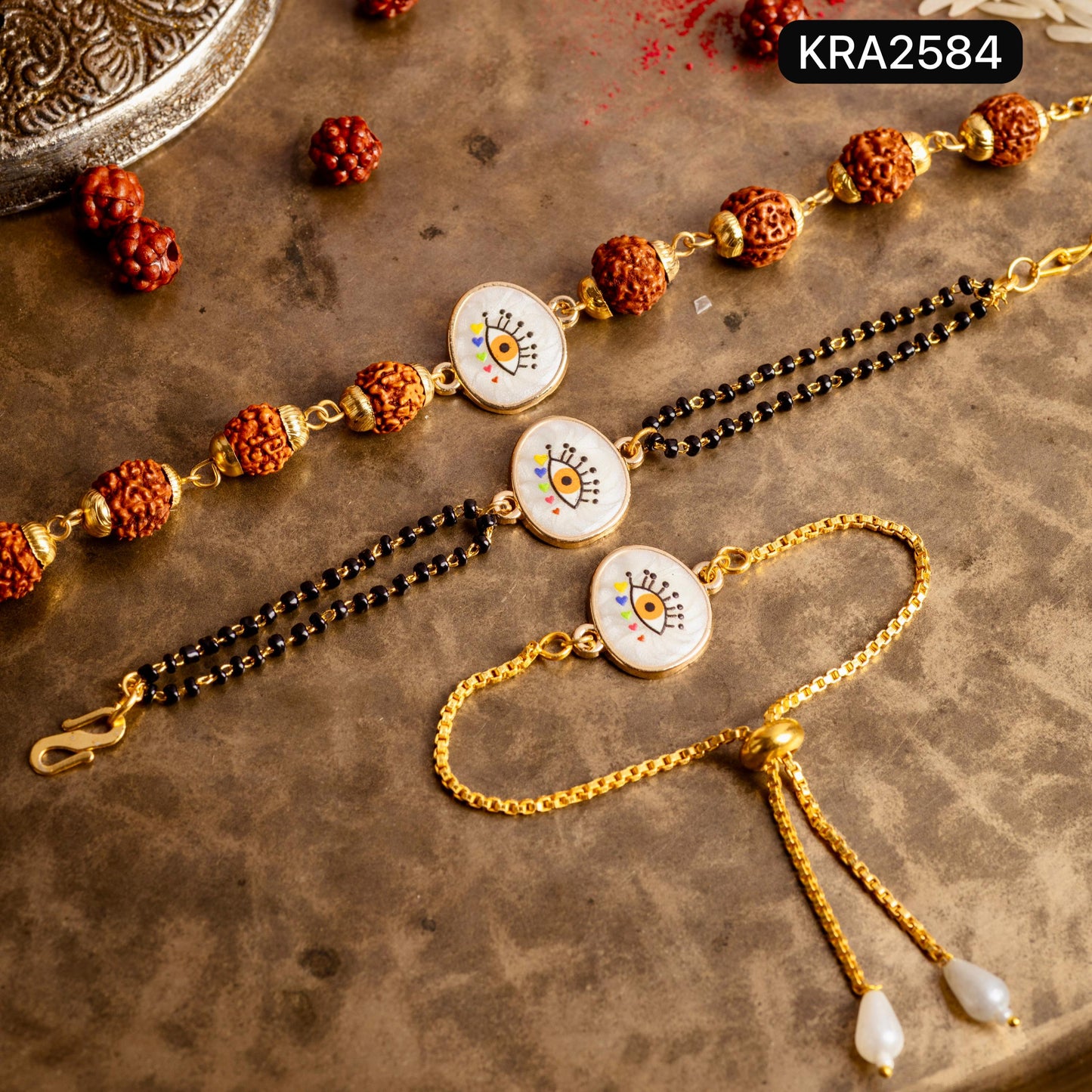 Mother Of Pearl Evil Eye Rudraksha Bracelet For Bhai With Black Beads Bracelet For Bhabhi (KRA2584)