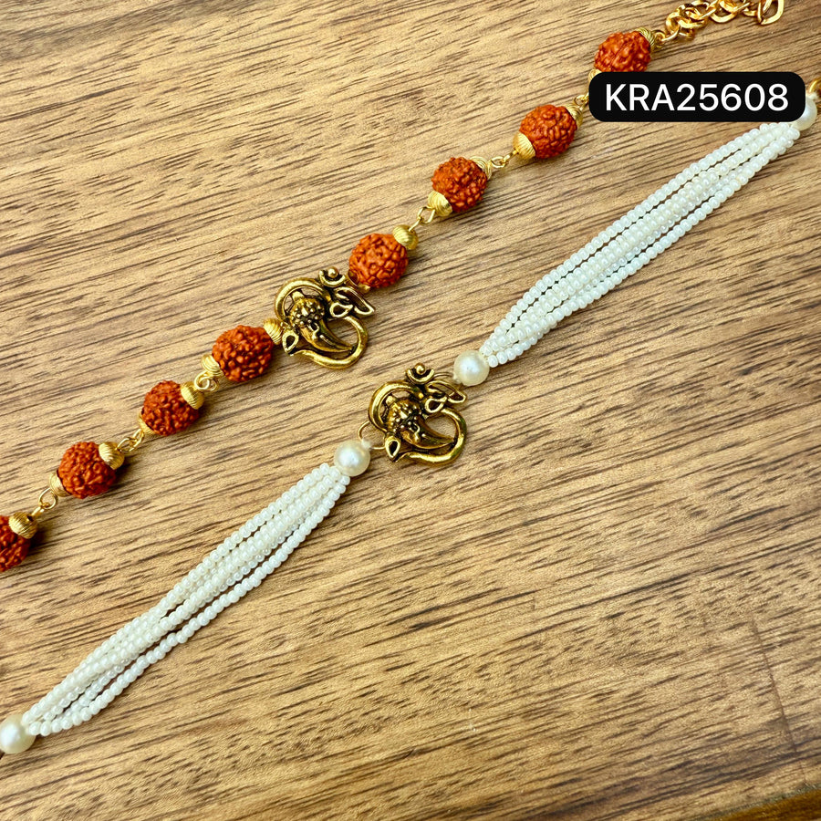 OM With Ganesh Ji Metal Broach Rudraksha Bracelet With Pearls Bracelet Set (KRA25608)