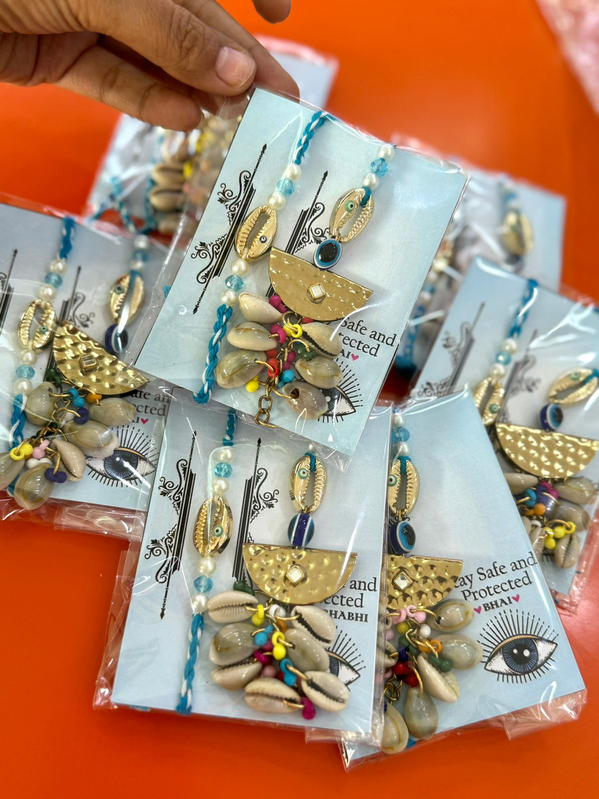 Elegant Sea Shell Braided Rakhi & Lumba Set