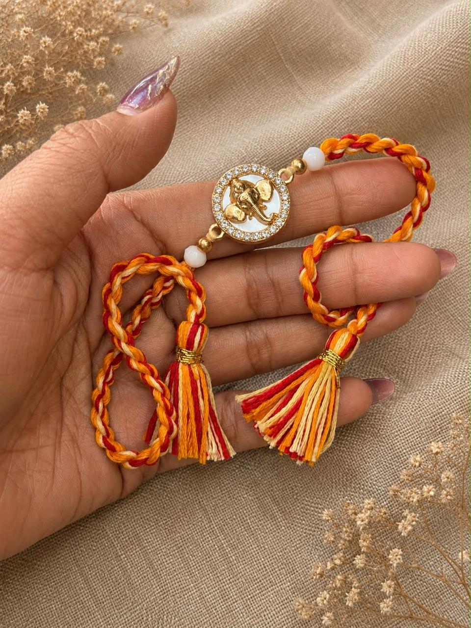 Ganesha Rakhi With Heavy Tassel