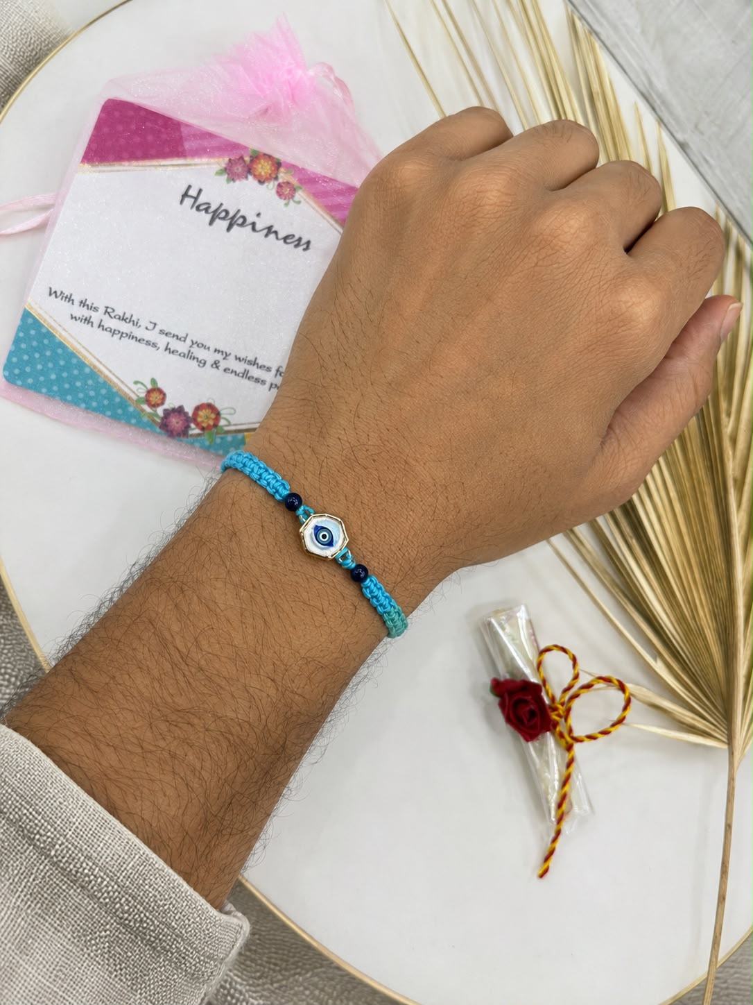 Hand Woven Evil Eye Rakhi