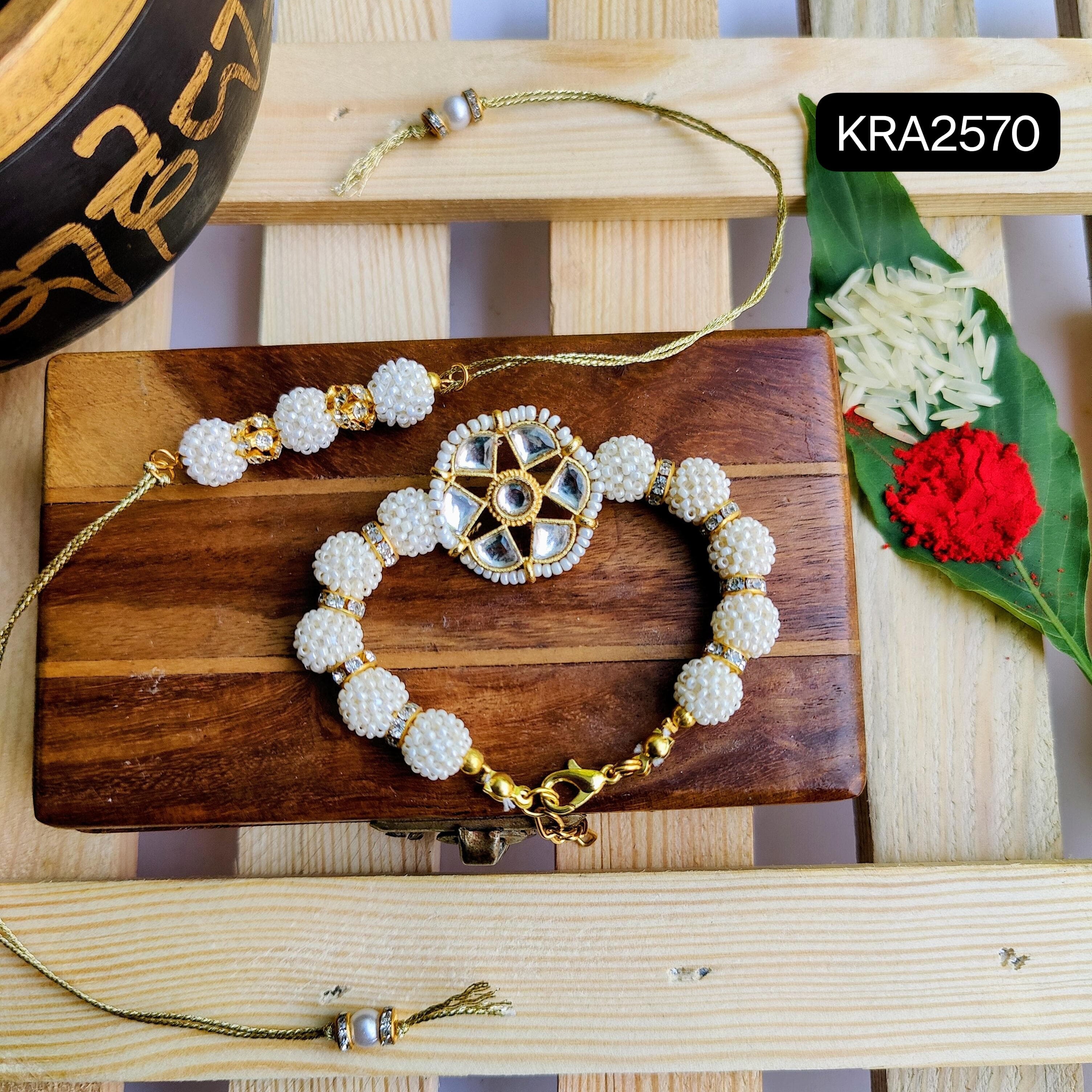 Elegant Cheed Rakhi & Bracelet Set (KRA2570)